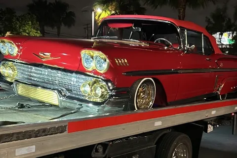 Classic car tow of a red Impala in Norwalk, CA by Carsaad Towing