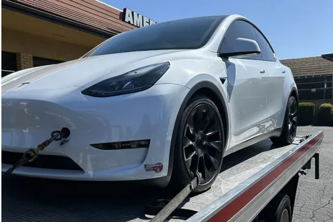 Flatbed tow of a Tesla in Norwalk, CA by Carsaad Towing