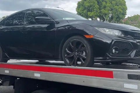 Light-duty tow of a Honda by Carsaad Towing