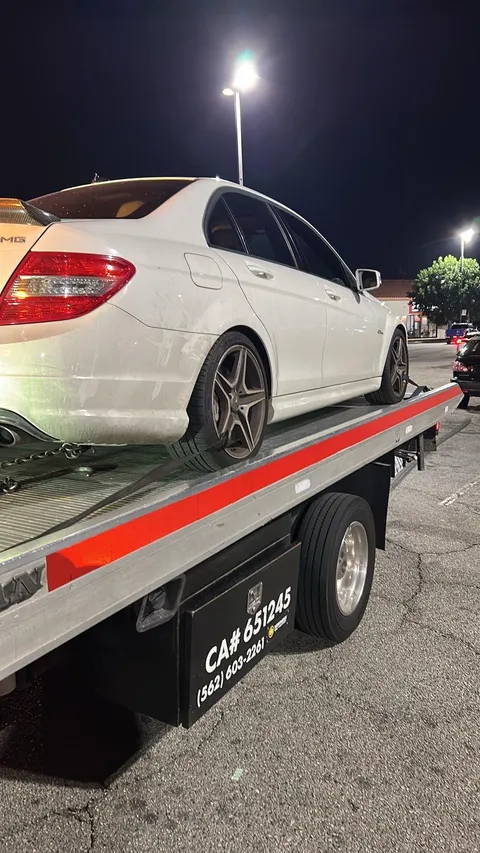 Late-night emergency towing service transporting a non-running vehicle safely across Buena Park, California.